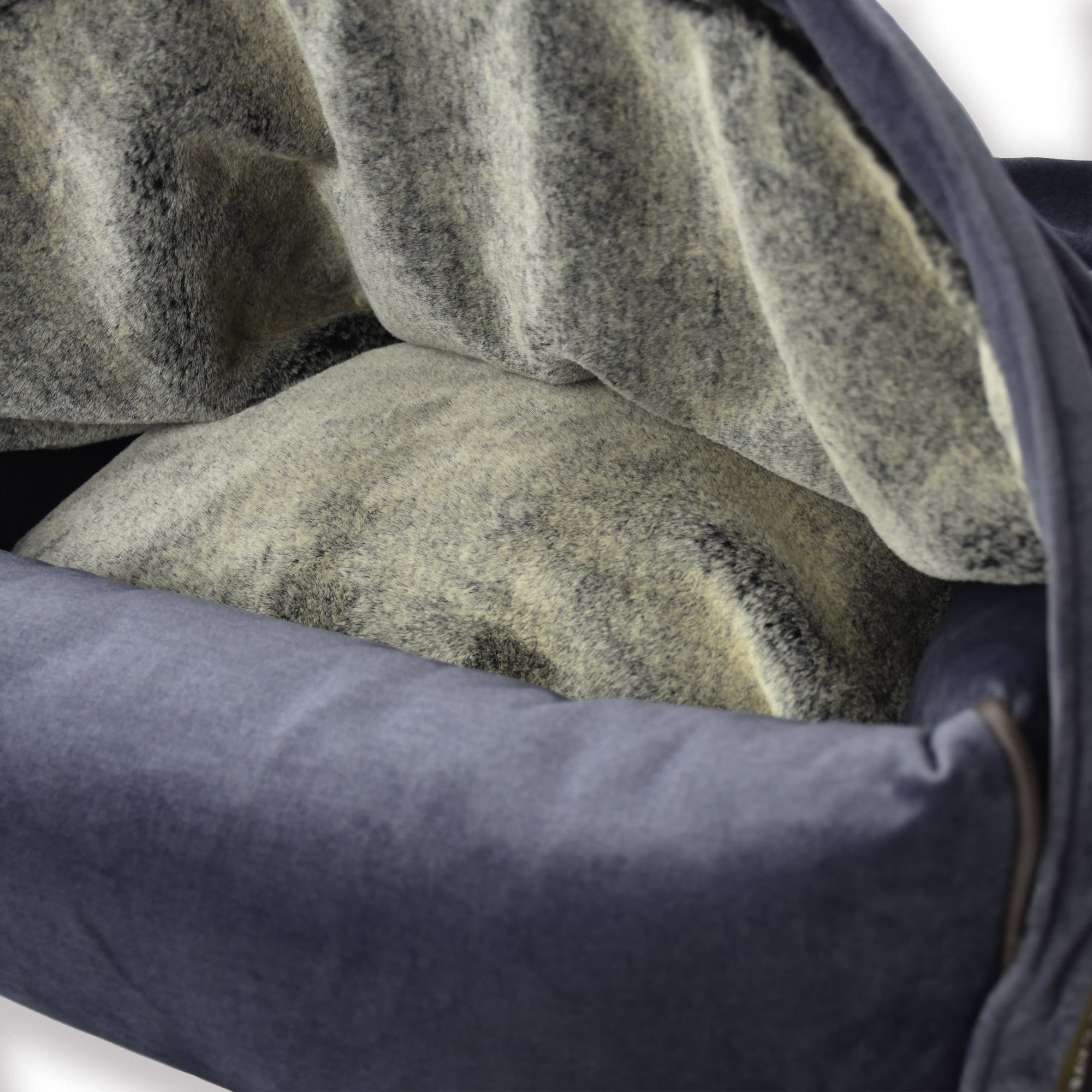 KONA CAVE® ultimate luxury snuggle dog cave bed in grey velvet and lined in super soft, human-grade faux-fur. Gifts for spoiled dogs and cats. Most luxurious and warmest pet bed.