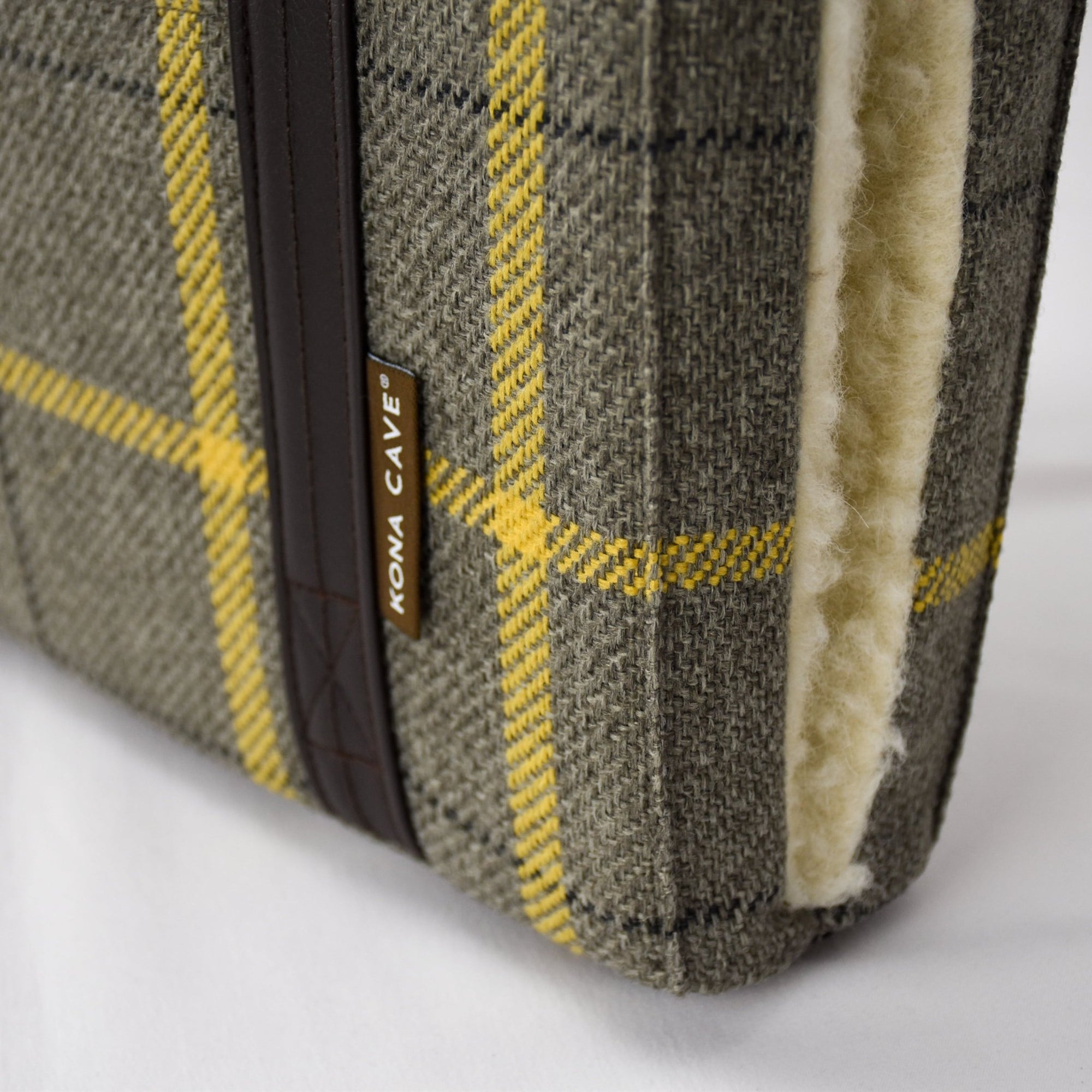 Close up of the luxury beige and gold  designer portable travel dog bed by KONA CAVE® 