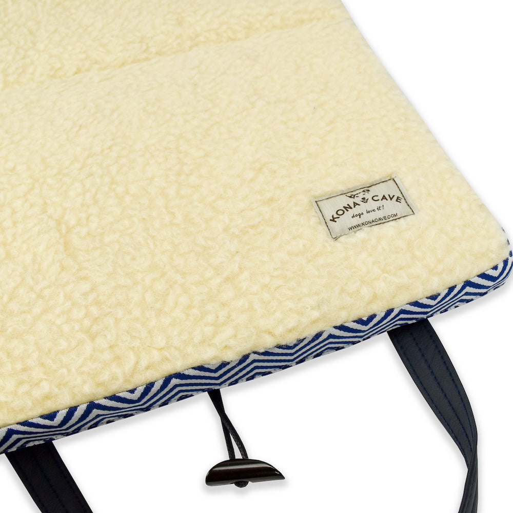 KONA CAVE® luxury folded Travel Dog Bed for restaurants, cars, travel, hotels, etc. 100% natural, vegan-friendly shearling wool lining keeps your dog cool in the heat and warm in the cold