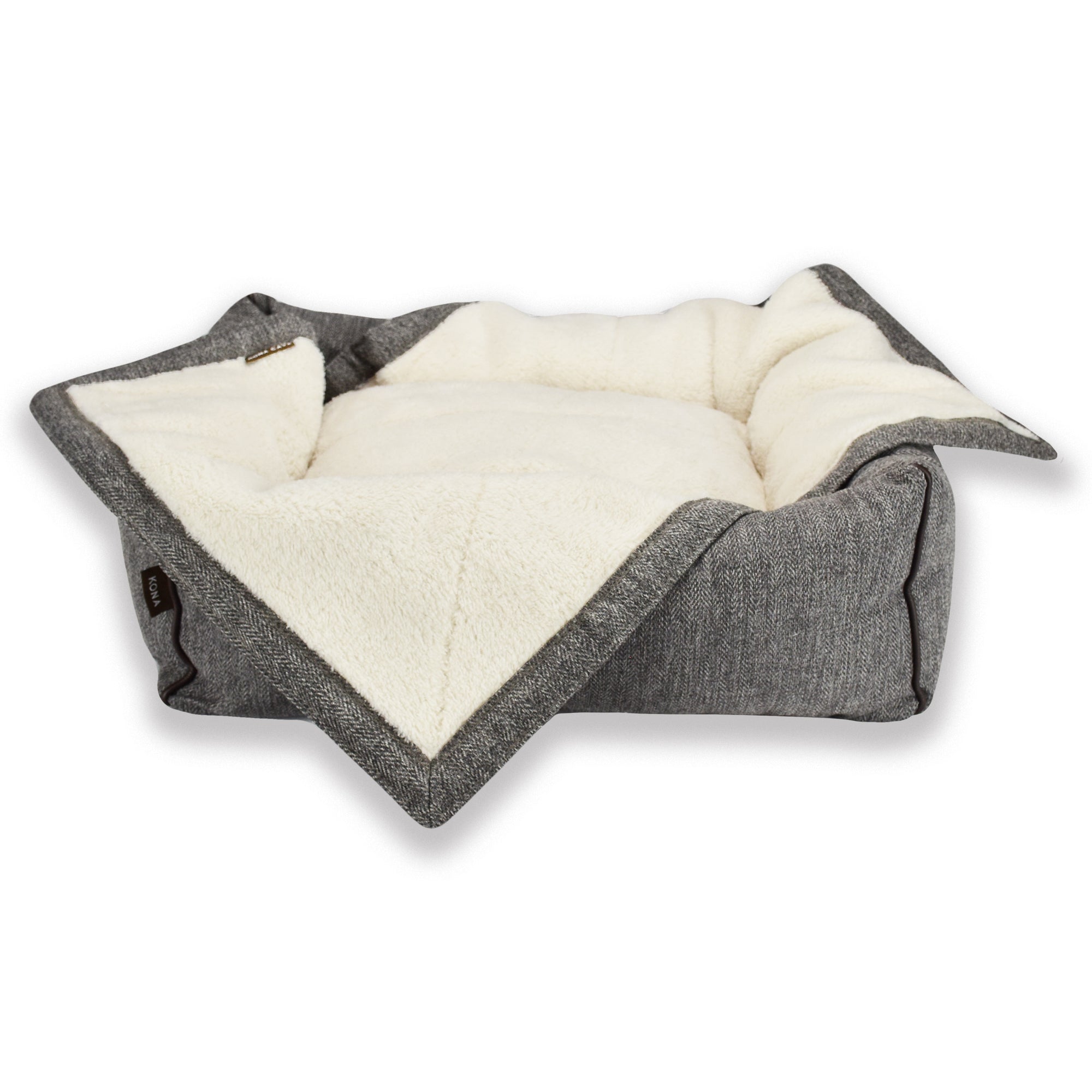 KONA CAVE® Pet Blanket fits perfects to our small Snuggle Cave and Bolster Beds, adding a little layer of extra comfort and a barrier to keep beds clean between washes 