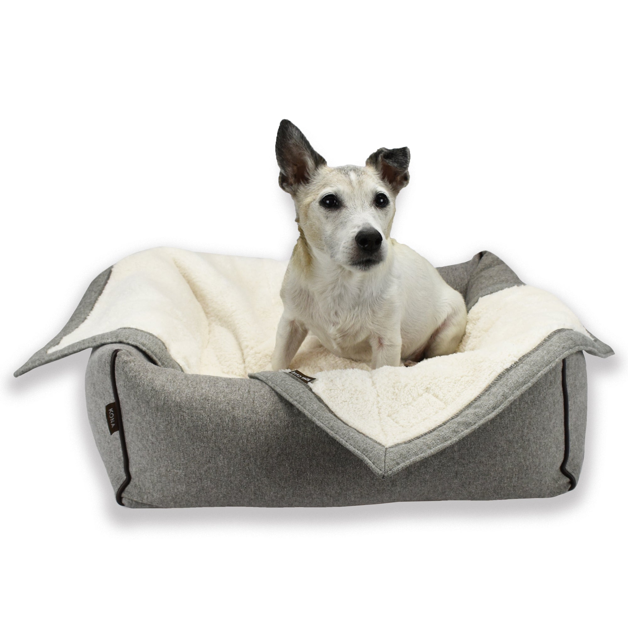 Kona the Jack Russel Terrier models the KONA CAVE® Grey Flannel Pet Blanket and Bolster Bed in size Small