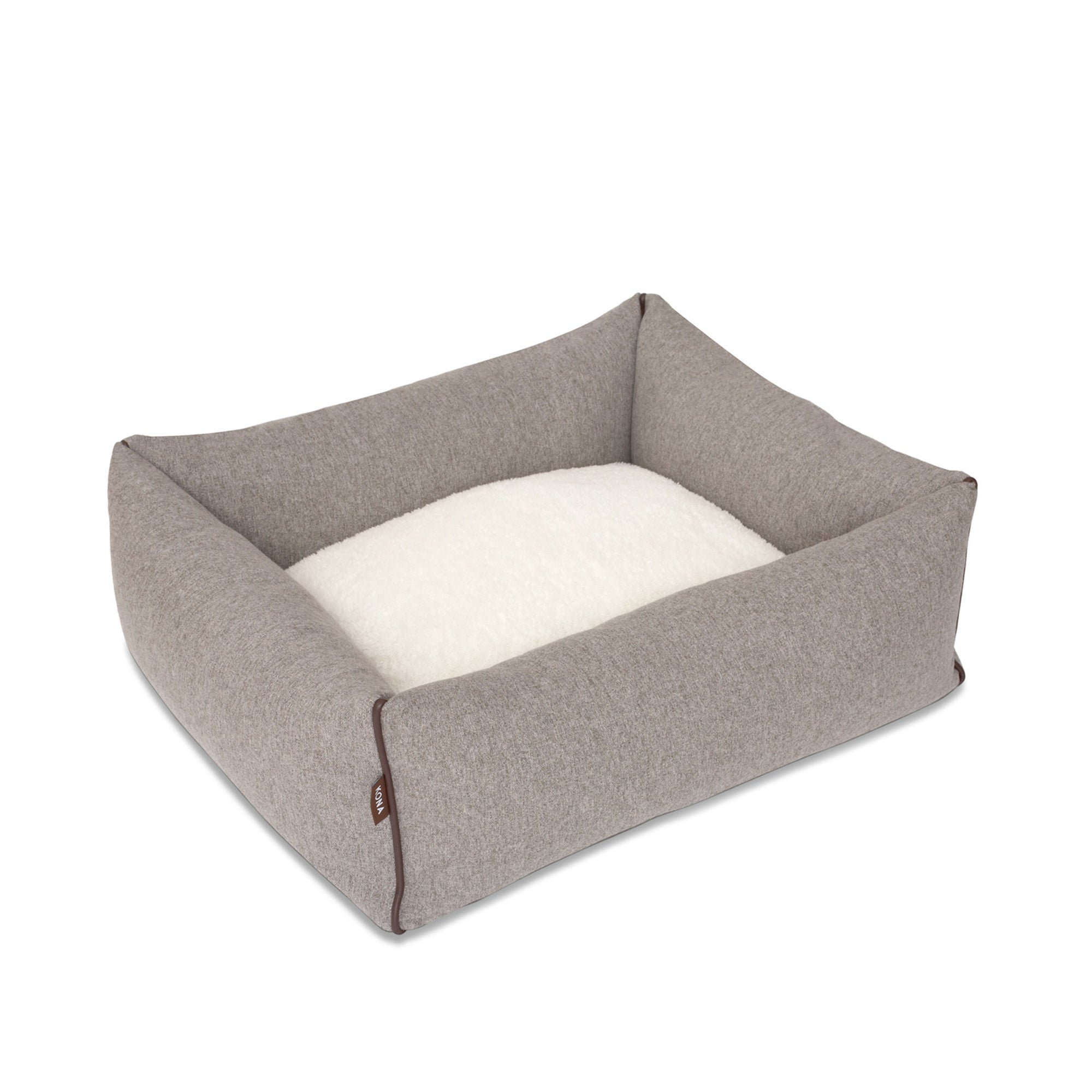 KONA CAVE® luxury bolster dog bed in soft grey flannel fabric with leather trim.